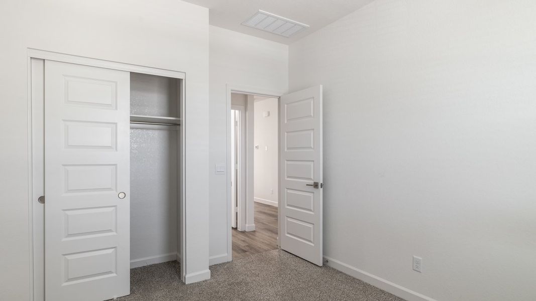 Spacious, unfurnished interior of a new home in Zanjero Pass, Waddell (Image 16).