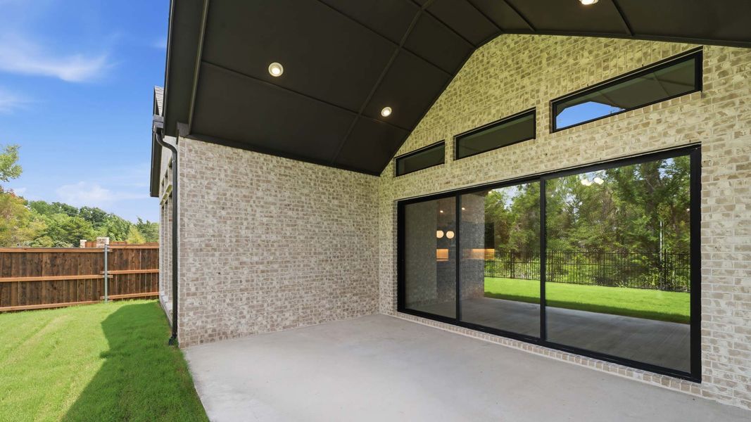 Exterior details and patio area of a home in The Parks at Wilson Creek, Celina (Image 3).