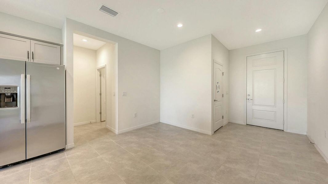 Spacious, unfurnished interior of a new home in Palm Grove Real Estate and Homes for Sale in Lakewood Ranch, FL - Neal Communities, Lakewood Ranch (Image 23).