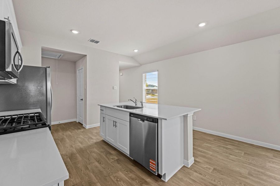 Furnished interior view inside a new home in Whisper South, San Marcos (Image 4).