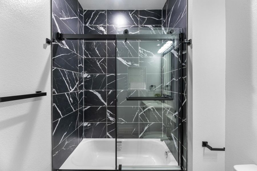 Modern Farmhouse look in this shower/tub combo.