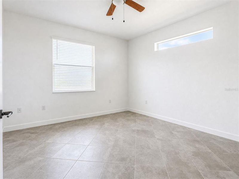 Spacious, unfurnished interior of a new home in Palm Lake at Coco Bay, Englewood (Image 16). Spacious, unfurnished interior of a new home in Palm Lake at Coco Bay, Englewood (Image 16).