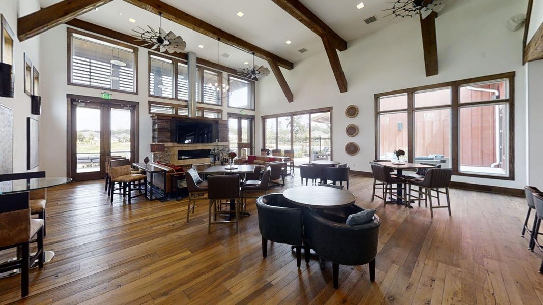 Common area with ample seating, full kitchen and fireplace to host events. Neighborhood director sets up events for Holidays and so much more.