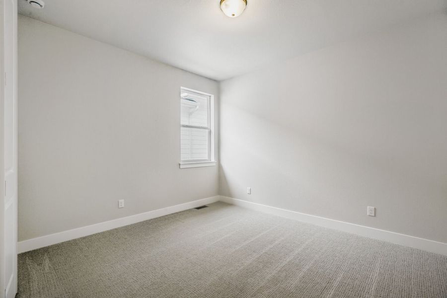 Spacious, unfurnished interior of a new home in RainDance, Windsor (Image 34).
