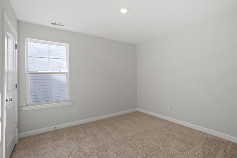 Spacious, unfurnished interior of a new home in Sweetbrier, Durham (Image 24).
