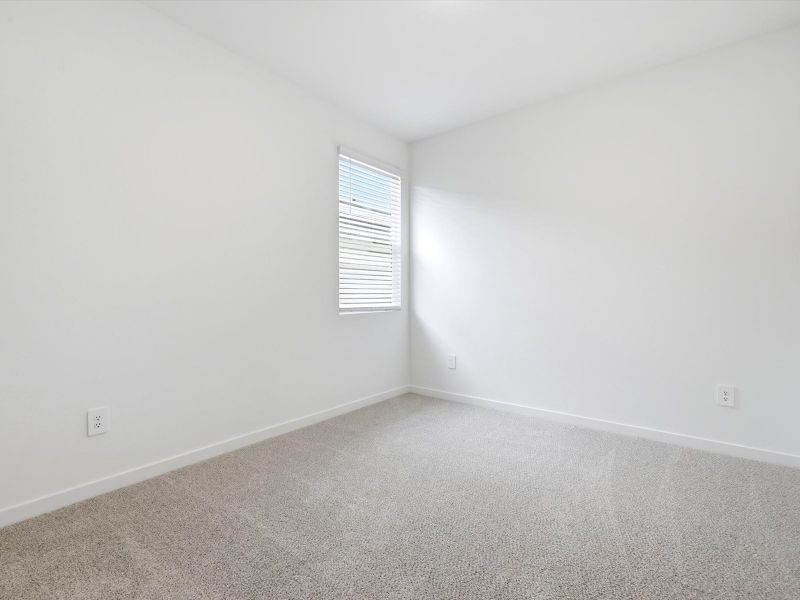 Spacious, unfurnished interior of a new home in Rancho Mirage Estate Series, Maricopa (Image 16).