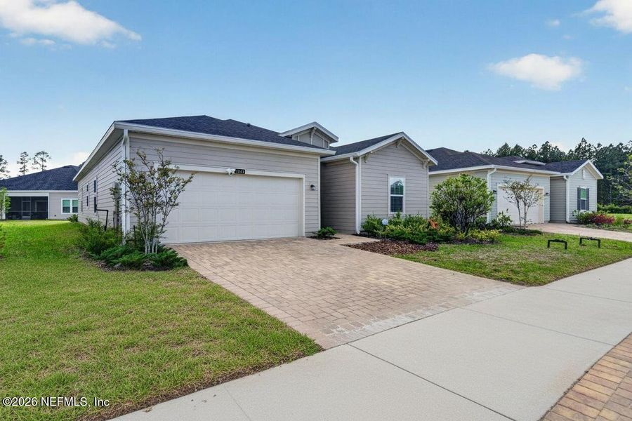 Front exterior of a new home in , Jacksonville, FL, highlighting curb appeal (Image 22).