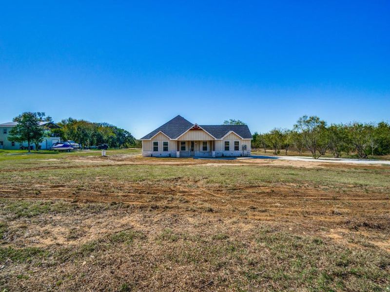 View of front of property featuring a front lawn