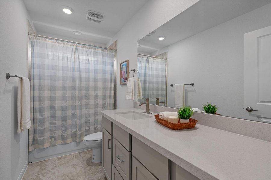 Full bathroom with tub/shower combo
