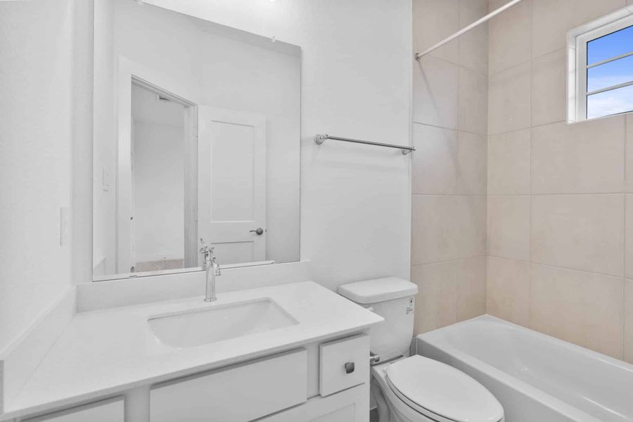 Furnished interior view inside a new home in Attwater 55s, Waller (Image 10).