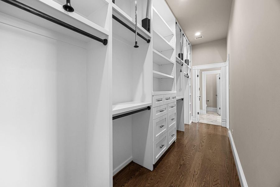 The primary closet offers floor to ceiling built-ins with endless organizing options! The primary closet offers floor to ceiling built-ins with endless organizing options!