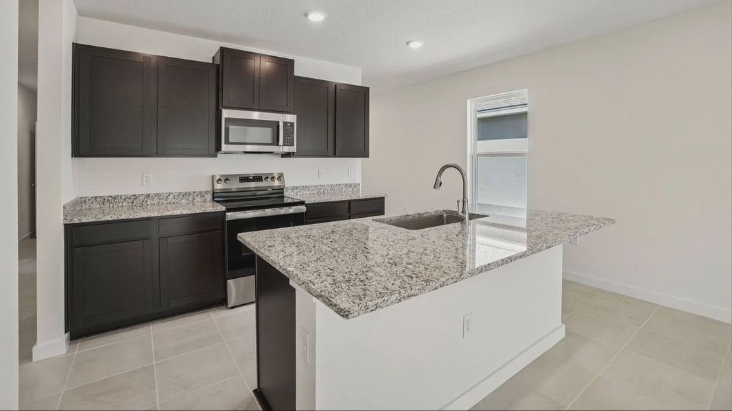Furnished interior view inside a new home in Willowbrook North, Winter Haven (Image 14).
