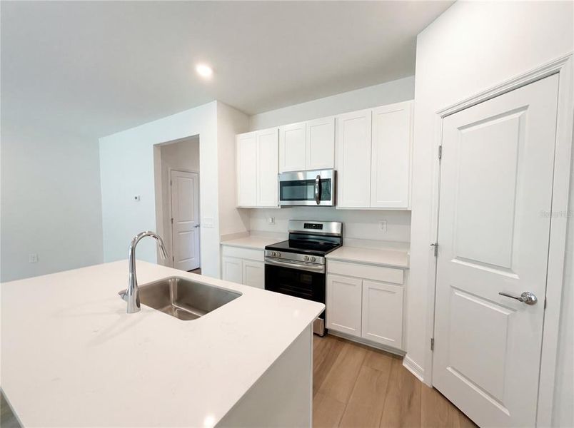 Furnished interior view inside a new home in Grand Park, Dunnellon (Image 9).