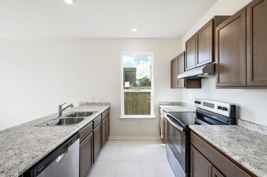 Furnished interior view inside a new home in Creekside at Estancia, Austin (Image 6).