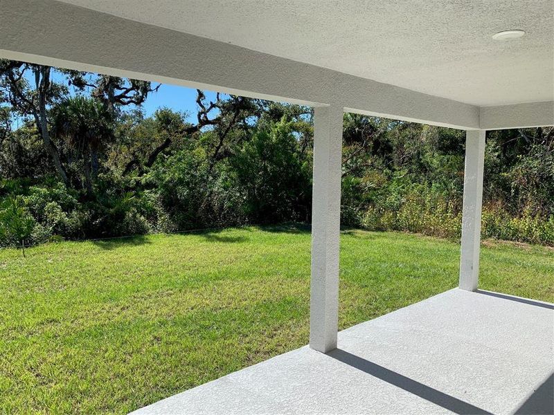 Exterior details and patio area of a home in Port Charlotte, Port Charlotte (Image 3).