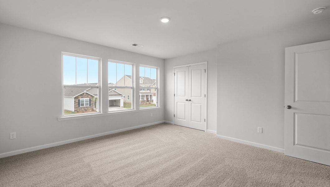 Representative unfurnished interior of a home built from the Biltmore by D.R. Horton in Woodglen, Piedmont (Image 19).