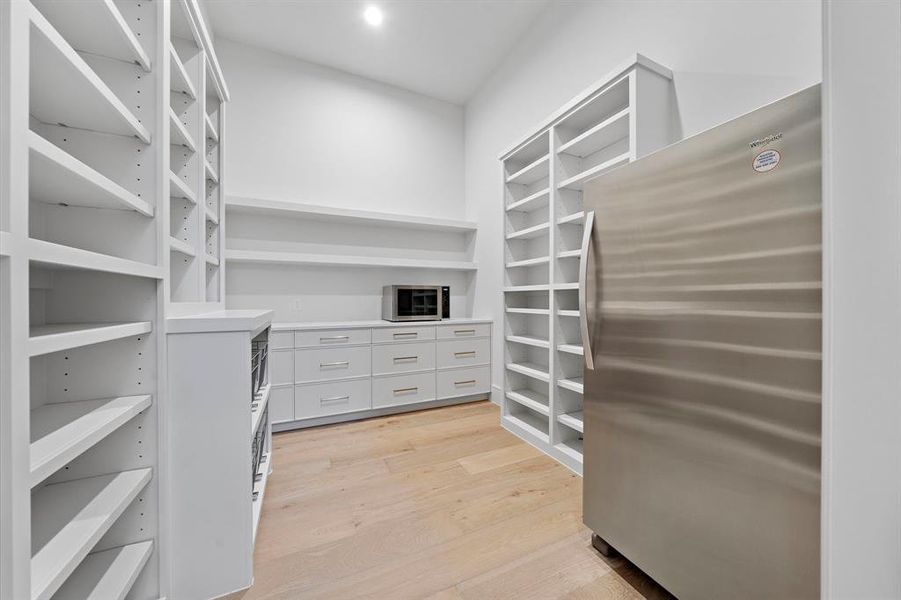 Great build-out in the pantry with extra refrigerator.