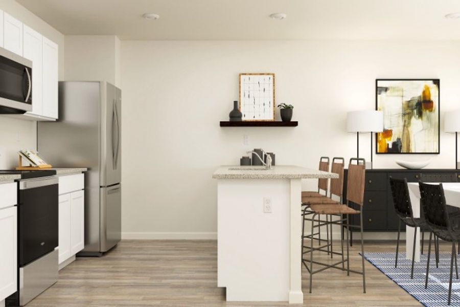 A kitchen with a table and chairs. A kitchen with a table and chairs.