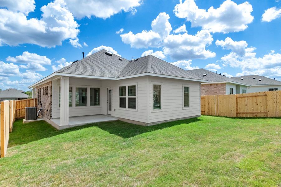 Exterior details and patio area of a home in Crosswinds, Kyle (Image 4).