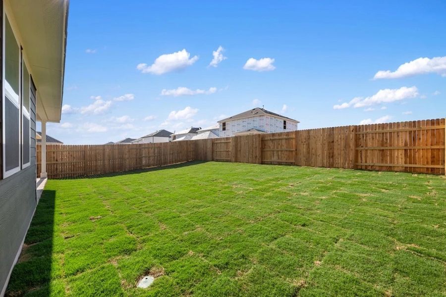 Exterior details and patio area of a home in Patterson Ranch, Georgetown (Image 31).