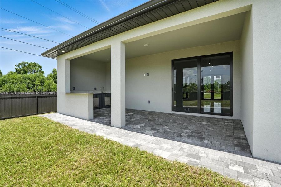 Front exterior of a new home in , Cape Coral, FL, highlighting curb appeal (Image 21). Front exterior of a new home in , Cape Coral, FL, highlighting curb appeal (Image 21).