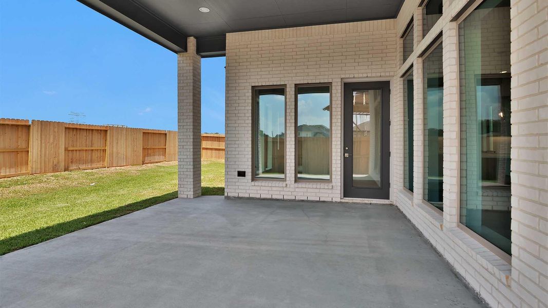 Exterior details and patio area of a home in Sienna, Missouri City (Image 3). Exterior details and patio area of a home in Sienna, Missouri City (Image 3).