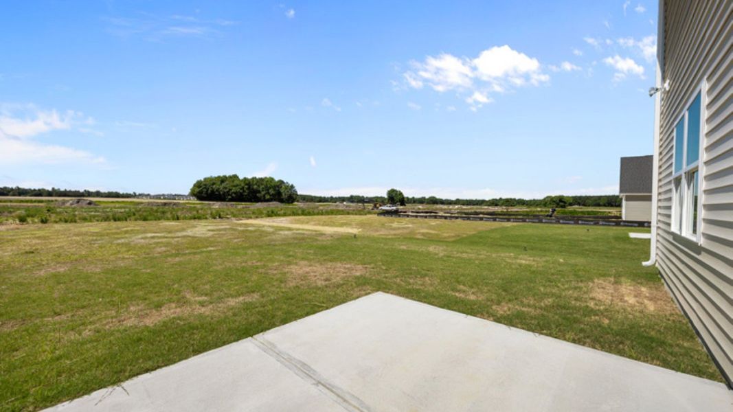 Exterior details and patio area of a home in East Ridge, Ayden (Image 3). Exterior details and patio area of a home in East Ridge, Ayden (Image 3).