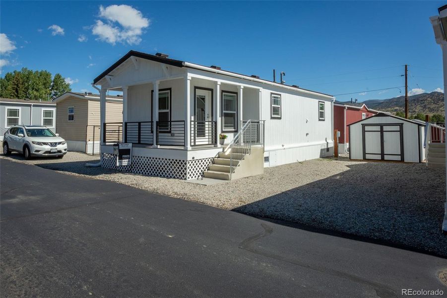 Front exterior of a new home in , Salida, CO, highlighting curb appeal (Image 17).