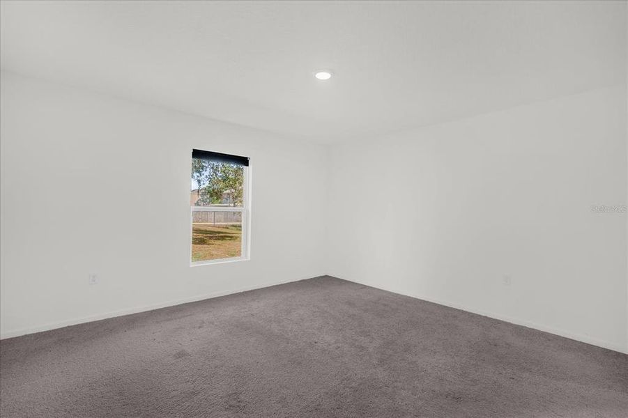 Spacious, unfurnished interior of a new home in Poinciana Village, Kissimmee (Image 14).