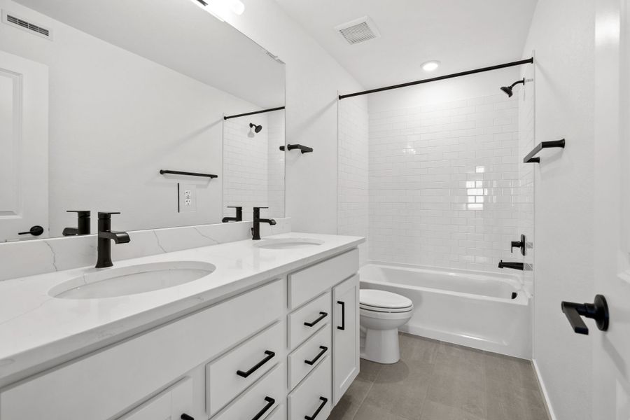 Furnished interior view inside a new home in Harvest Crossing, Aurora (Image 8).