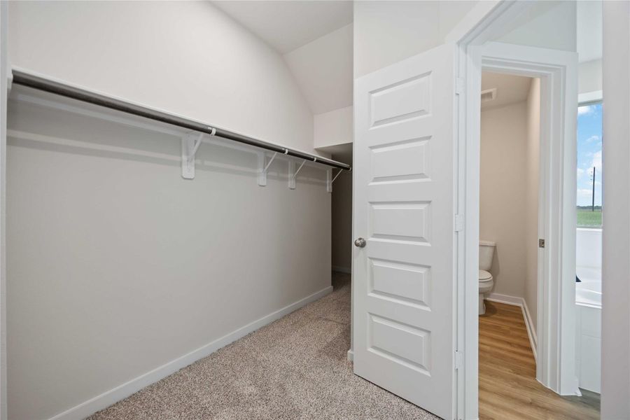 Retreat to the primary bedroom, which features a huge walk-in closet and luxury bathroom. Retreat to the primary bedroom, which features a huge walk-in closet and luxury bathroom.
