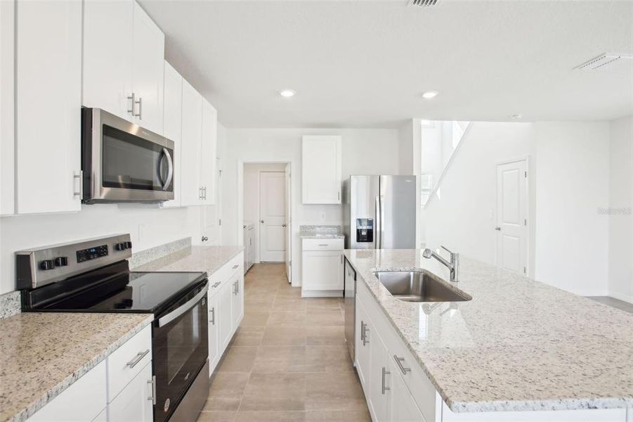 Furnished interior view inside a new home in Benton Hills - Premier Series, Brooksville (Image 4). Furnished interior view inside a new home in Benton Hills - Premier Series, Brooksville (Image 4).