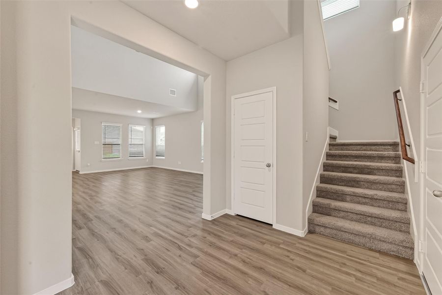 Spacious, unfurnished interior of a new home in Sunterra, Katy (Image 29).
