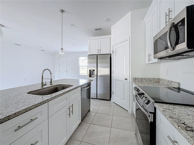 Furnished interior view inside a new home in , Ocala (Image 6).