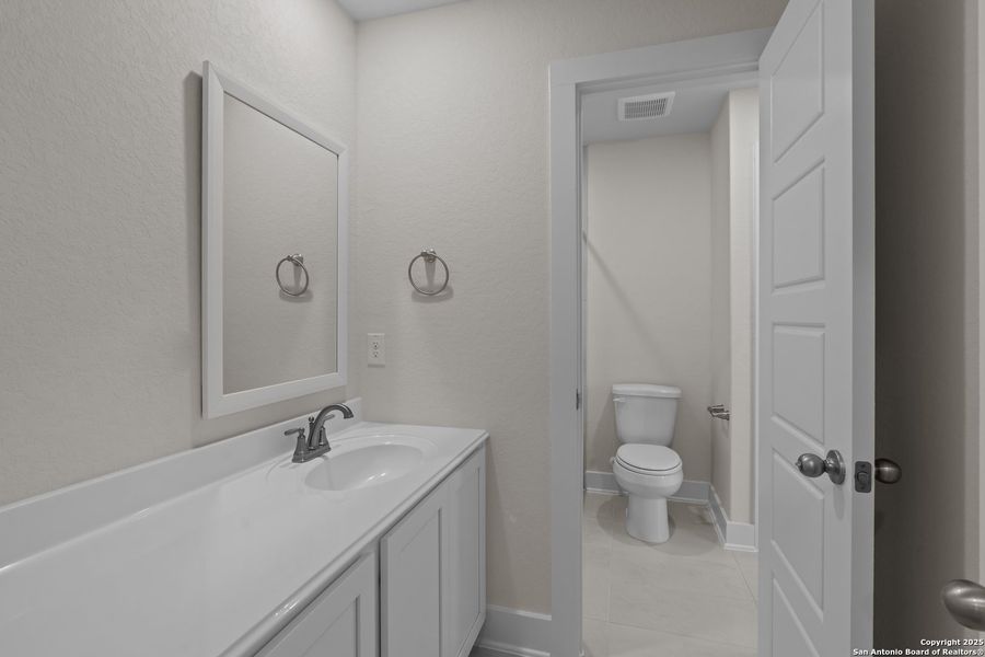 Furnished interior view inside a new home in Hunters Ranch, San Antonio (Image 9). Furnished interior view inside a new home in Hunters Ranch, San Antonio (Image 9).