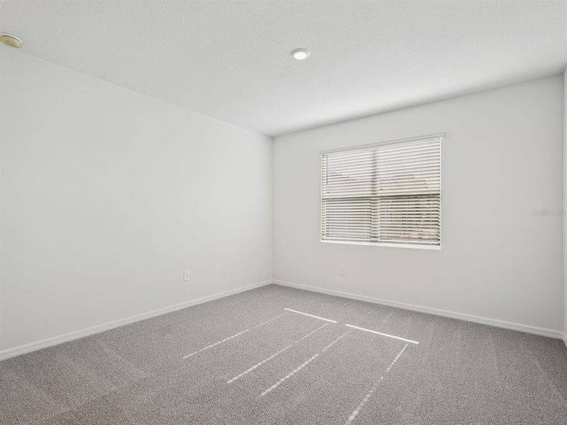 Spacious, unfurnished interior of a new home in Coasterra - Reserve Series, Palmetto (Image 28).