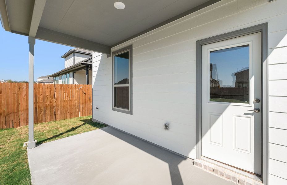 Exterior details and patio area of a home in Saddleback at Santa Rita Ranch, Liberty Hill (Image 29). Exterior details and patio area of a home in Saddleback at Santa Rita Ranch, Liberty Hill (Image 29).