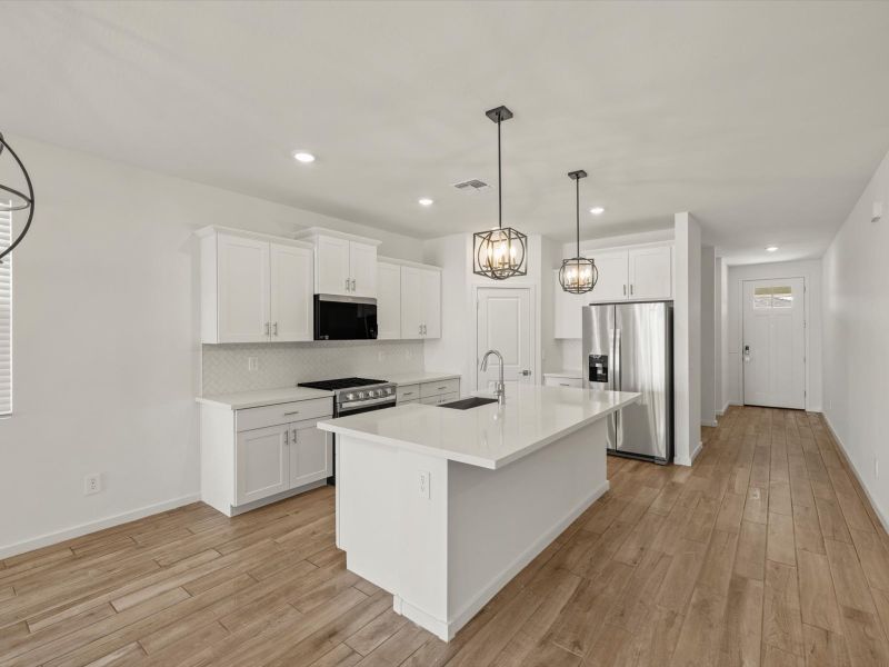Furnished interior view inside a new home in Silva Farms - Estate Series, Goodyear (Image 1). Furnished interior view inside a new home in Silva Farms - Estate Series, Goodyear (Image 1).