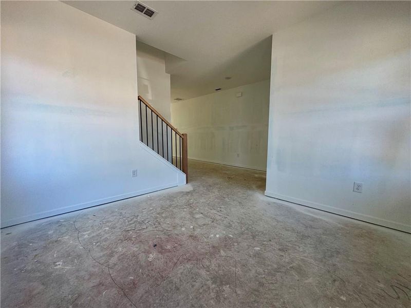 Spacious, unfurnished interior of a new home in Eastlyn Crossing - Single Family, Flowery Branch (Image 8). Spacious, unfurnished interior of a new home in Eastlyn Crossing - Single Family, Flowery Branch (Image 8).