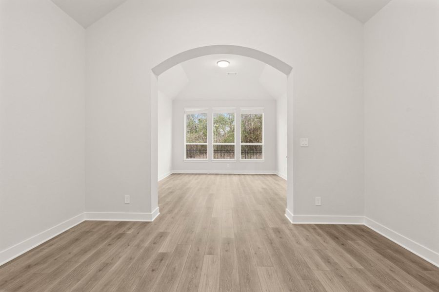 HUGE game room and media room facing backyard