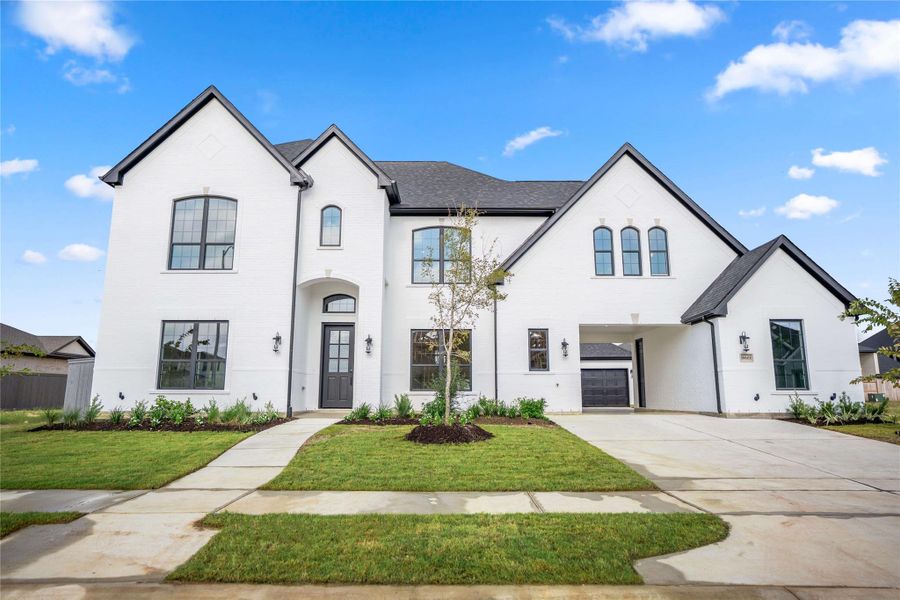 Front exterior of a new home in Jubilee, Hockley, TX, highlighting curb appeal (Image 2). Front exterior of a new home in Jubilee, Hockley, TX, highlighting curb appeal (Image 2).