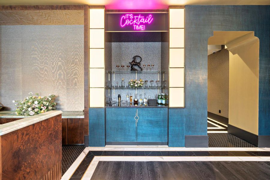 Lobby at London House features a chic bar area, designed for socializing and relaxation. Lobby at London House features a chic bar area, designed for socializing and relaxation.