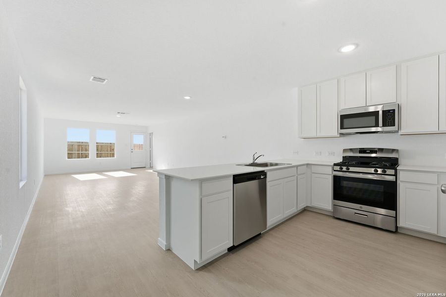 Furnished interior view inside a new home in , New Braunfels (Image 5).