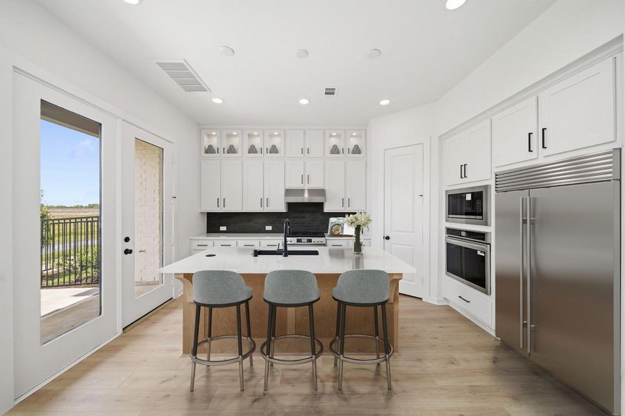 Furnished interior view inside a new home in Bridgeland, Cypress (Image 6).