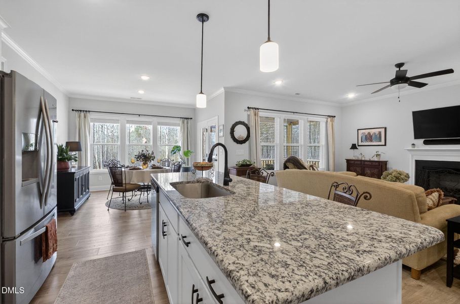 Kitchen opens to dining and living rooms