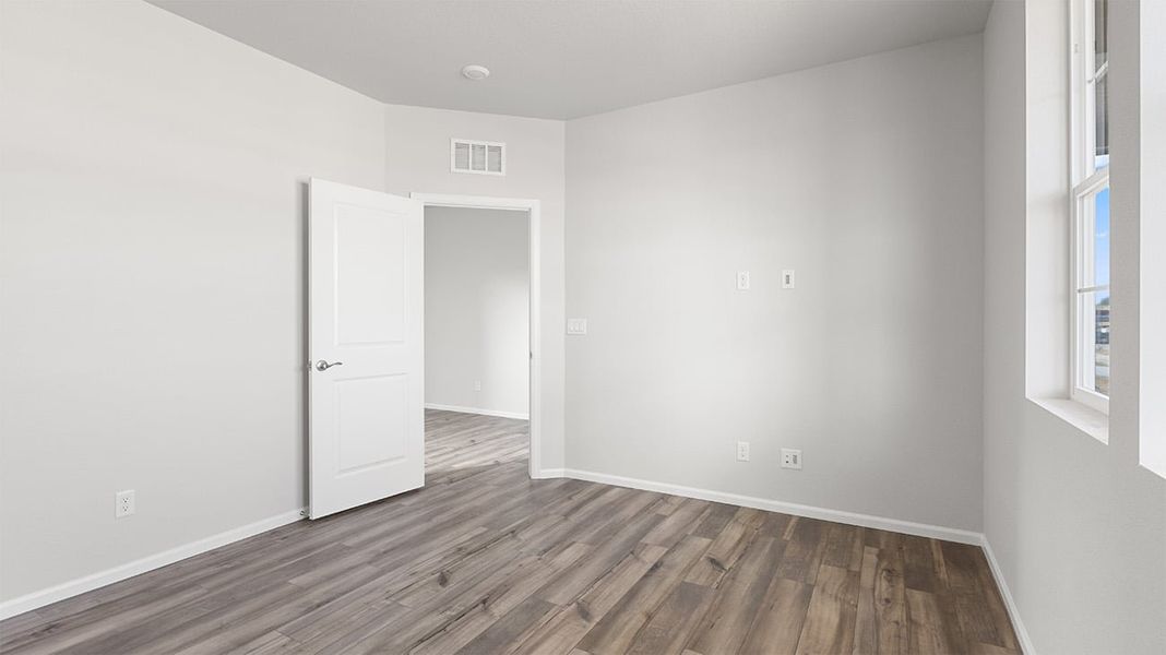 Spacious, unfurnished interior of a new home in The Legacy Collection at Talon Pointe, Thornton (Image 7).