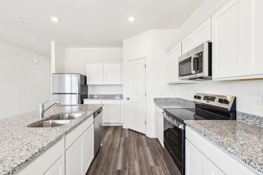 Furnished interior view inside a new home in Sunterra Lakes, Brookshire (Image 13).