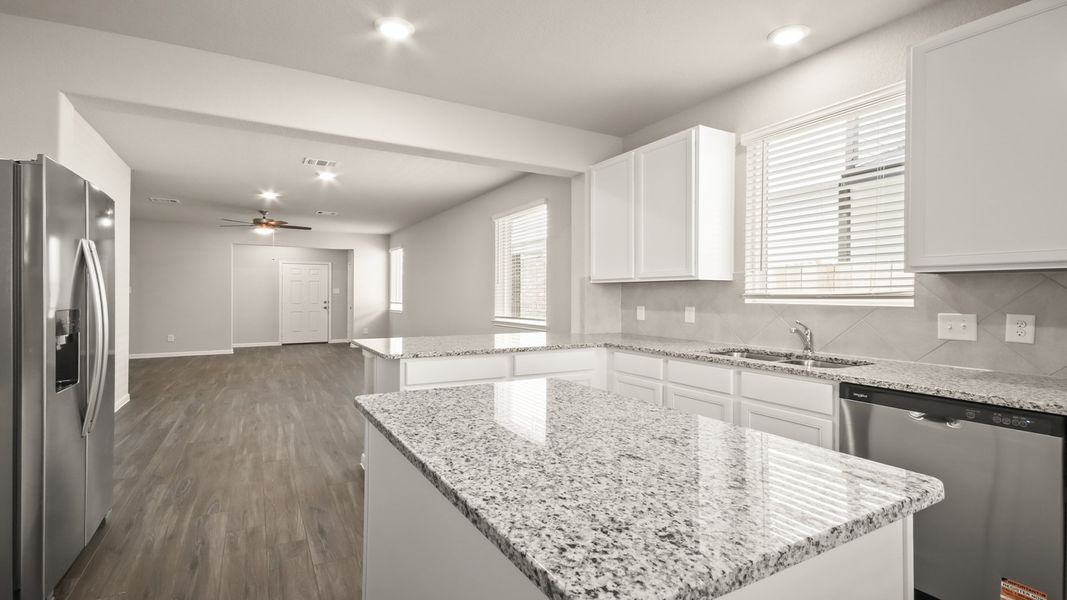 Kitchen to Dining Area and Family Room