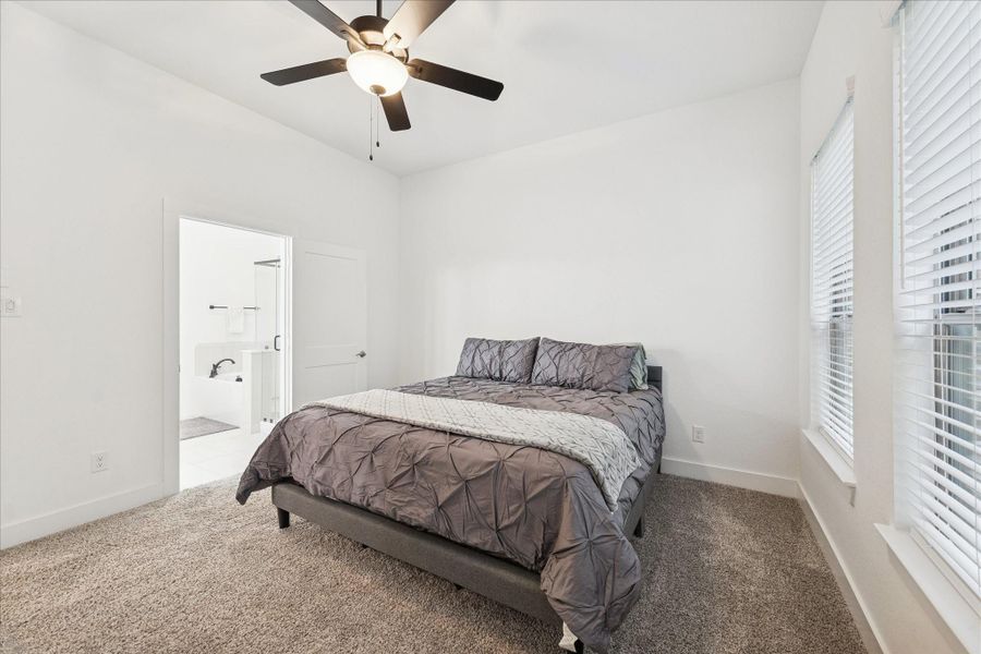 Furnished interior view inside a new home in , Conroe (Image 9).