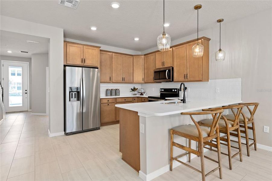 Furnished interior view inside a new home in Parkside Trails, Clermont (Image 13).